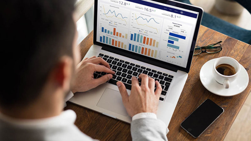 Man looking at dashboard of information