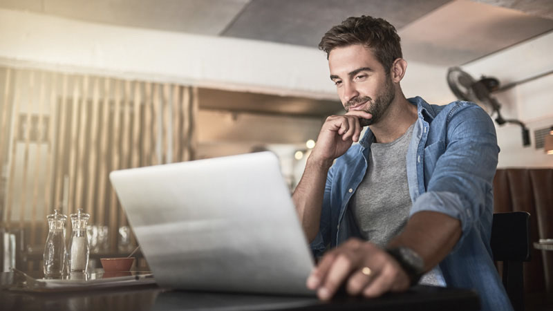 Man looking at laptop